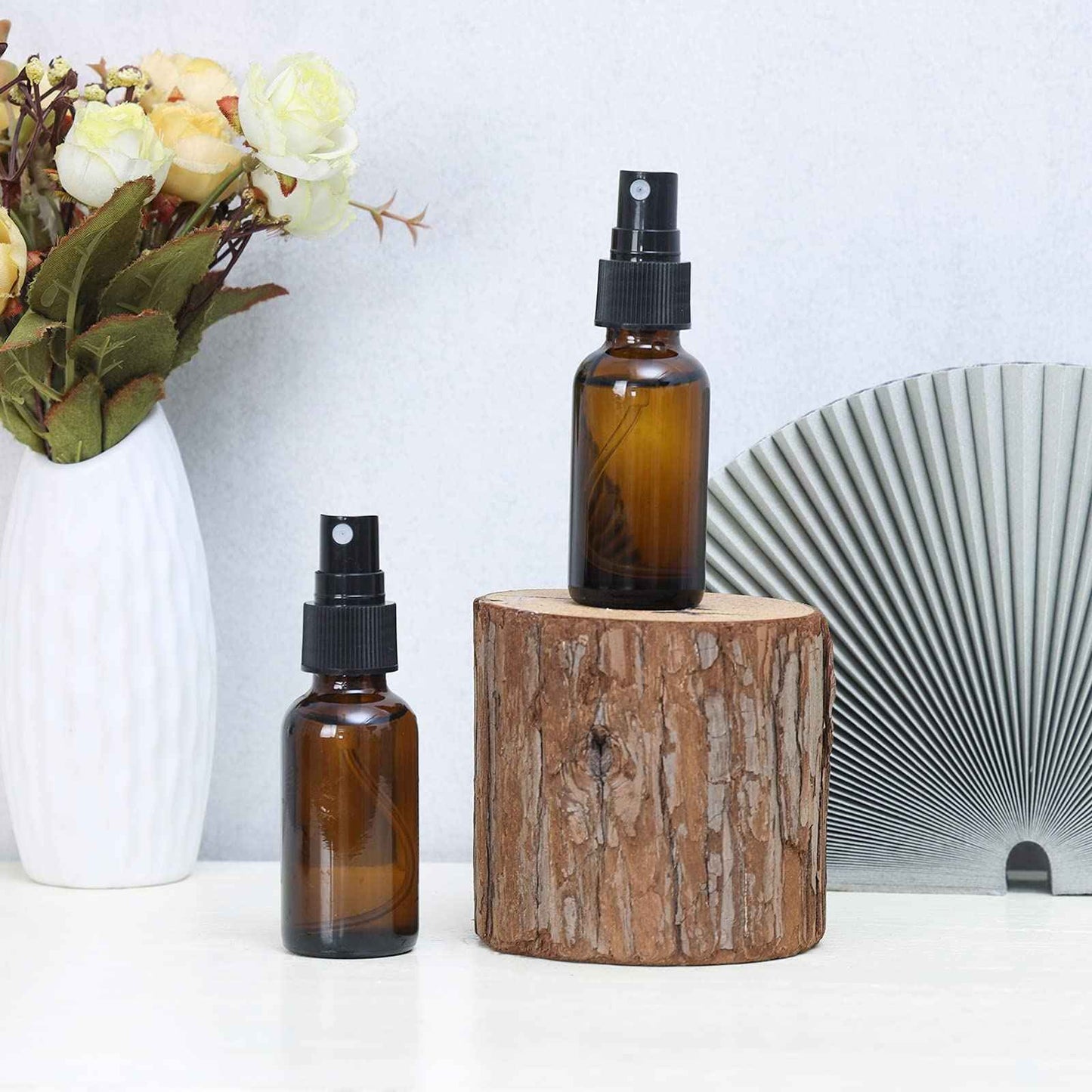 YONKAN 2oz Glass Spray Bottle, Fine Mist Boston Glass Bottles with Black Fine Mist Sprayer Small Clear Bottles for Essential Oils, Bath, Beauty, Hair & Cleaning, Amber, Pack of 12