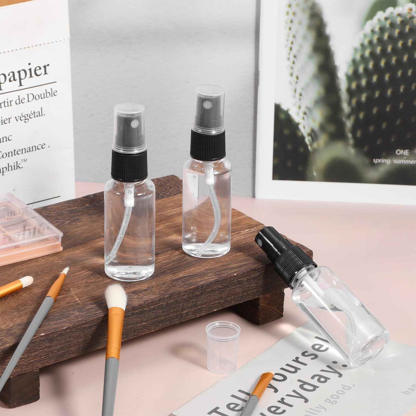 Meyeyaia 1oz/30ml Small Spray Bottle - 100 Pcs Bulk Plastic Spray Bottles, Refillable Clear Fine Mist Sprays Bottle for Skin Hair Care, Plant Care & Home Cleaning