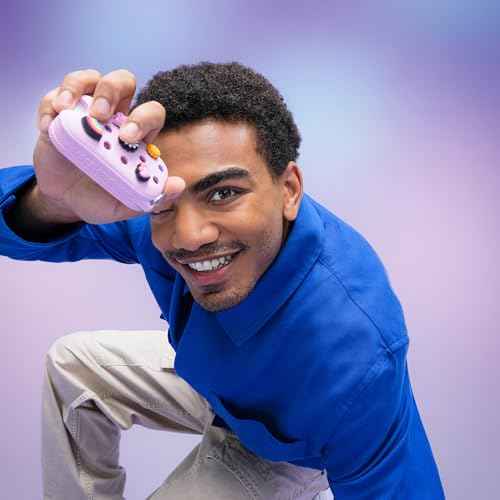 Touchland x Crocs Limited Edition Mist Case 1 Fl. OZ., Stylish Hand Sanitizer Spray Accessory, with 5 Jibbitz Charms and Keyring, Sugarpop Pink Color