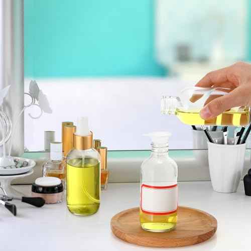 Fumete 2 Pack Glass Bottles 4oz Empty Refillable Liquid Containers with 1 Label 1 Funnel for Essential Oils Hair Travel Plants Cleaning Skin Care(Clear, Golden Top,Mist Bottle)