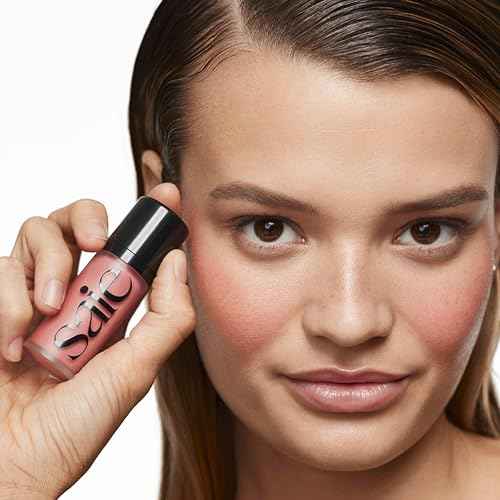 Saie Dew Liquid Blush for Cheeks - Hydrating Cream Blush Stick with a Blendable + Buildable Formula - Skincare Infused Dewy Cheek Tint for a Natural Flush - Glowy Makeup Essential - Sweetie (.40 oz)