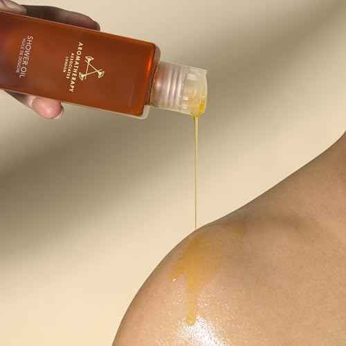 Aromatherapy Associates De-Stress Muscle Shower Oil. Powerful Blend of Rosemary, Ginger and Black Pepper Essential Oils to Soothe and Heal the Body (8.45 fl oz)