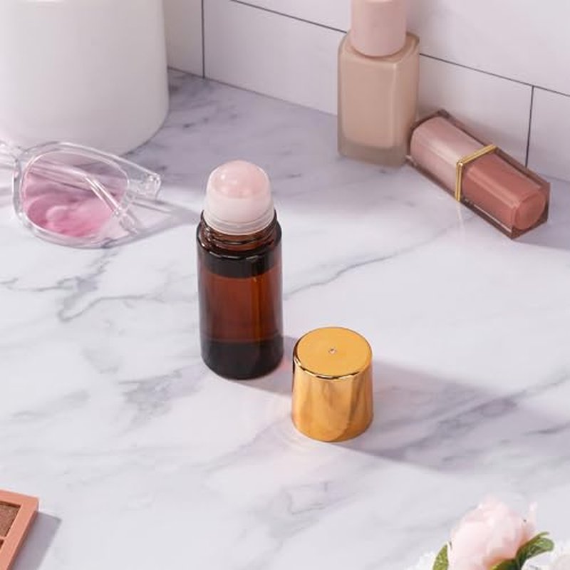 1.7oz Amber Glass Roll-On Bottles with Pink Crystal Rollerball