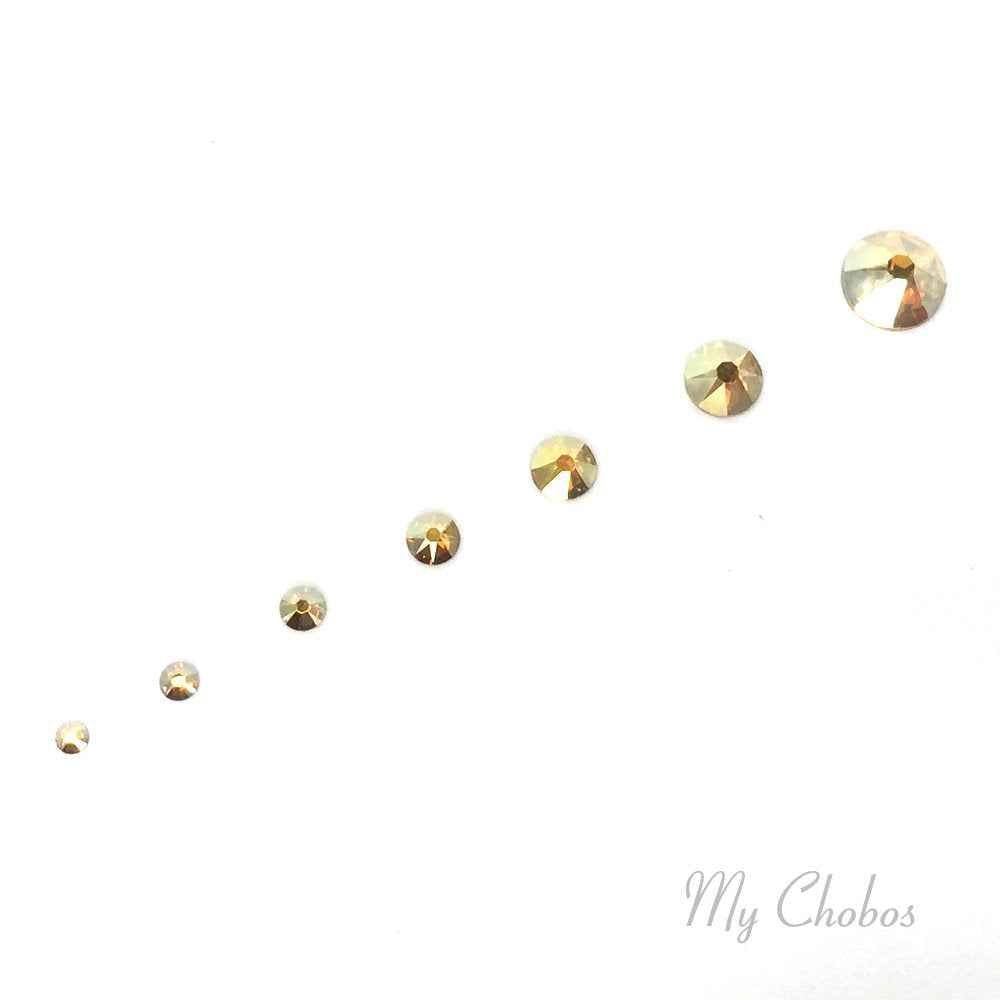 Crystal-Wholesale CRYSTAL METALLIC SUNSHINE (001 METSH) 144 pcs Swarovski 2058/2088 Crystal Flatbacks gold rhinestones nail art mixed with Sizes ss5, ss7, ss9, ss12, ss16, ss20, ss30 from Mychobos