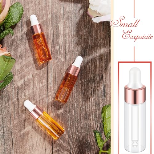 100 Pcs Mini Glass Oil Dropper Bottle Bulk, Clear Essential Small Empty Bottles Sample Containers Perfume Liquid Vials with Cap for Traveling (5 ml,Rose Gold)