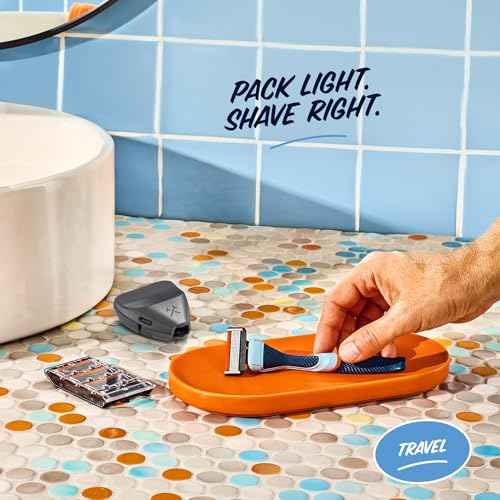 Dollar Shave Club | Travel Shave Set | 4 Extra Close Refill Cartridges, 1 Handle (Blue), 1 Razor Cover