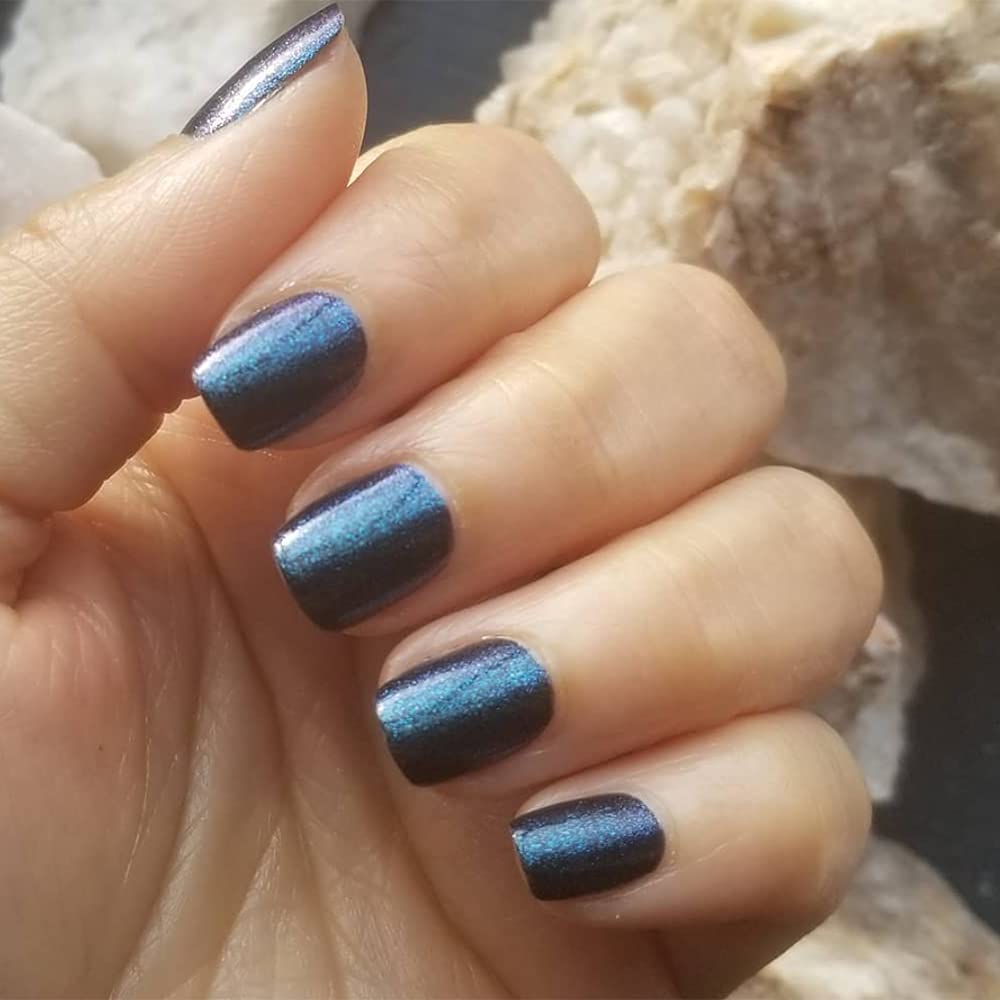 Dazzle Dry Nail Lacquer (Step 3) - Blue Blood - A full coverage galaxy-inspired shimmer that shifts blue, purple and green against a black base. (0.5 fl oz)