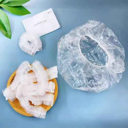 200PCS Disposable Shower Caps, Plastic Clear Hair Cap Large Thick Waterproof Bath Caps for Women & Men Unisex Reusable Travel Essentials for Deep Conditioning, Hair Treatment, Hotel, Spa, and Home Use