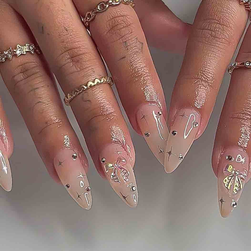 RikView Medium Press on Nails Almond Acrylic Nails Nude Nails with Rhinestones Glossy Full Cover Nails 24 PCs