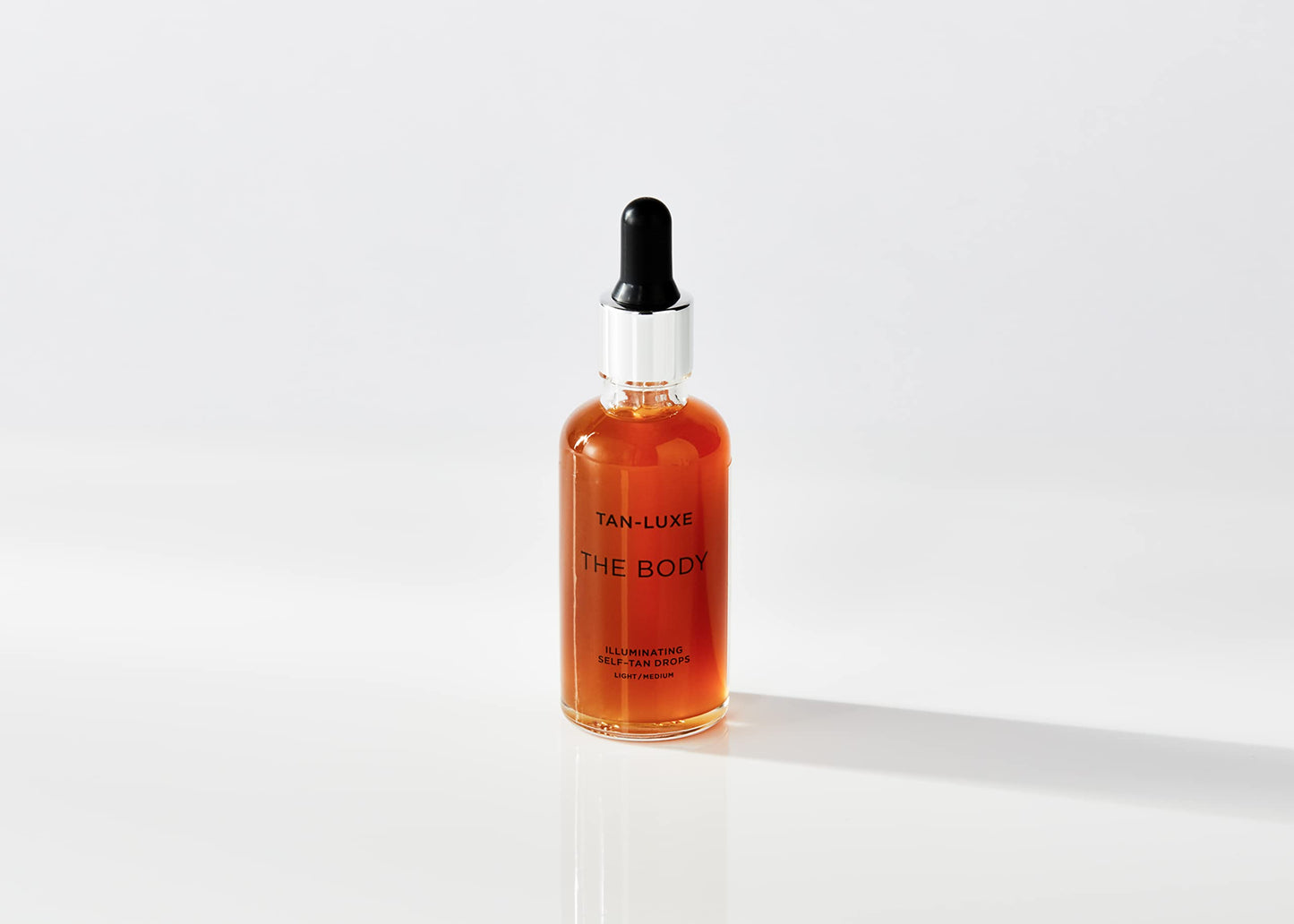 Tan-Luxe The Body Illuminating Self-Tan Drops, Customizable Self Tanning Serum, Natural Glow, Mix With Lotion, Vegan, Cruelty-Free, Streak-Free, 0.50 fl. oz/15 ml Bottle (Light/Medium)