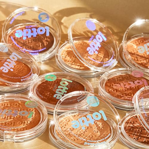 Lottie London Sunkissed Bronzer in Sunburst, Infused with bamboo extract and Vitamin E this skin-loving bronzer adds a buildable warm bronze for a defined finish