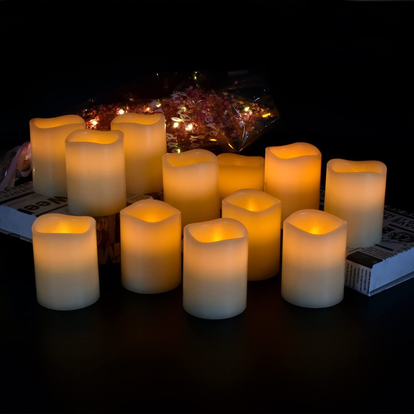 antizer Flameless Candles Battery Operated Candles Set of 12 Ivory Real Wax Pillars Flickering Candles Ivory LED Flameless Candles with Remote and Timer Control (D: 3" x H: 4")