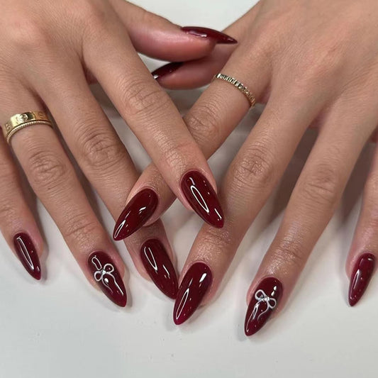 24Pcs Dark Wine Red Press on Nails Medium Fake Nails Valentine's Day Bow with Rhinestone Design Wine Red Glossy False Nails Red Solid Color Natural Acrylic Nails for Women Girls DIY Nail Decoration