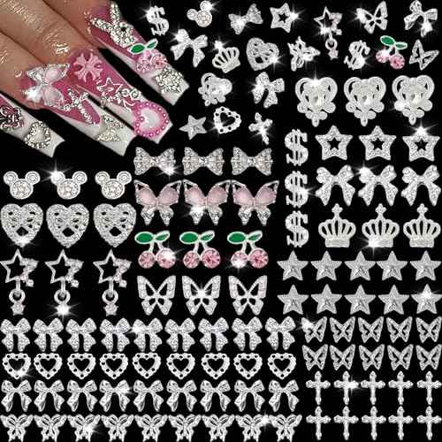 106 Pcs Nail Charms and Gems Silver Nail Charms Nail Rhinestones for Nails Design 3D Butterfly, Bow, Star,Cherry,Cross,Dollar,Heart Shapes for Acrylic Nails (19 Styles)