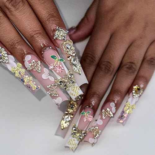 106 PCS Gold Nail Charms 3D Nail Art Charms Cherry Butterfly Cross Bow Star Heart Dollar 3D Nail Gems for Women Nail Art DIY Design