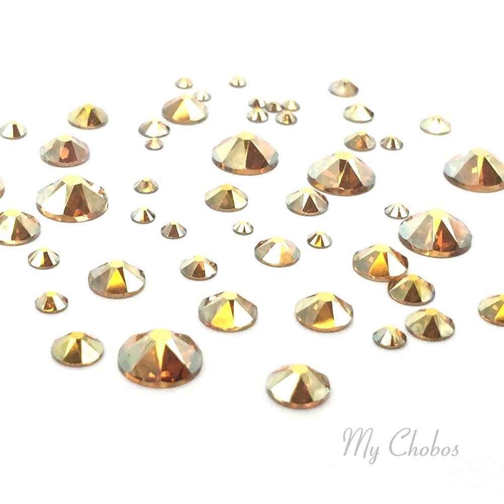 Crystal-Wholesale CRYSTAL METALLIC SUNSHINE (001 METSH) 144 pcs Swarovski 2058/2088 Crystal Flatbacks gold rhinestones nail art mixed with Sizes ss5, ss7, ss9, ss12, ss16, ss20, ss30 from Mychobos