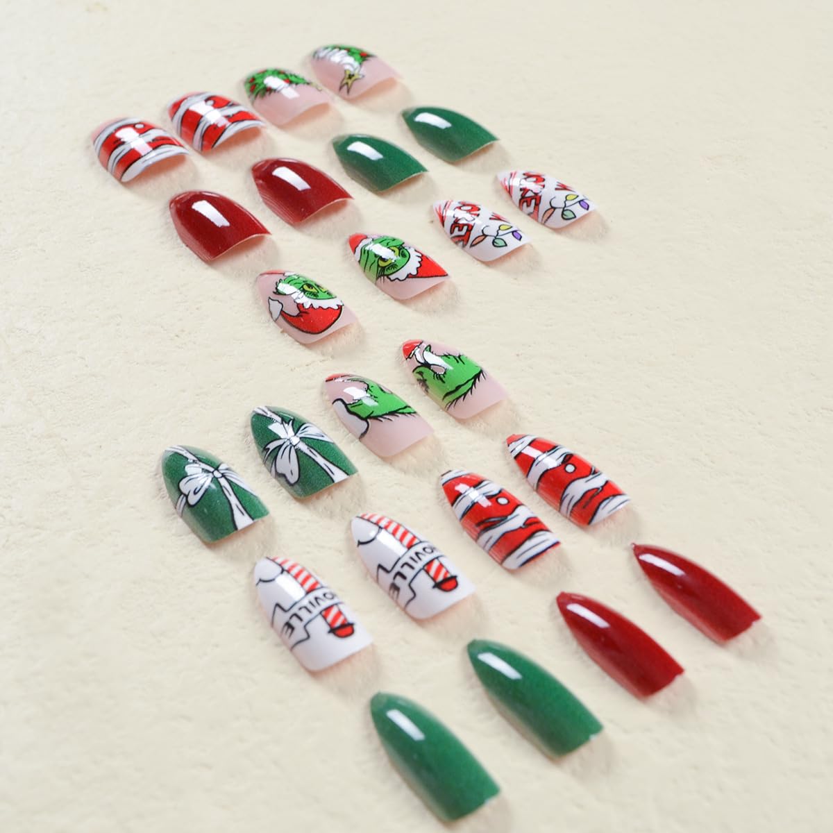 Christmas Press on Nails Short Almond Fake Nails Fun Cartoon Santa Claus Xmas Tree Stick on Nails Acrylic False Nails with Red Ribbon Designs Winter Holiday Artificial Glue on Nails for Women