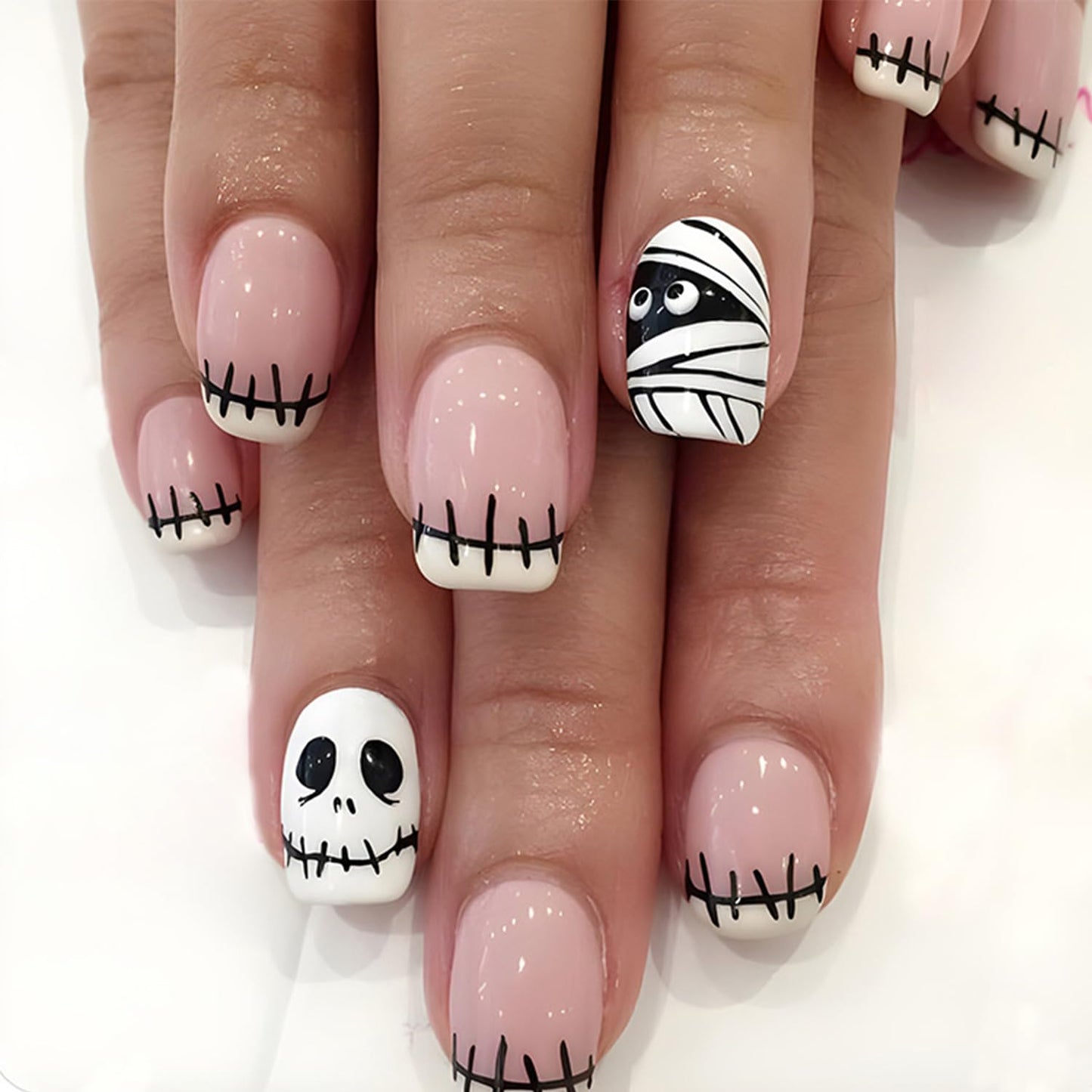 NEWSPIED Halloween Press on Nails Short Square Fake Nails White French Tip Acrylic Nails with Mummy Skull Design Cute Glue on Nails Halloween Nails Press on Full Cover False Nails for Women 24Pcs