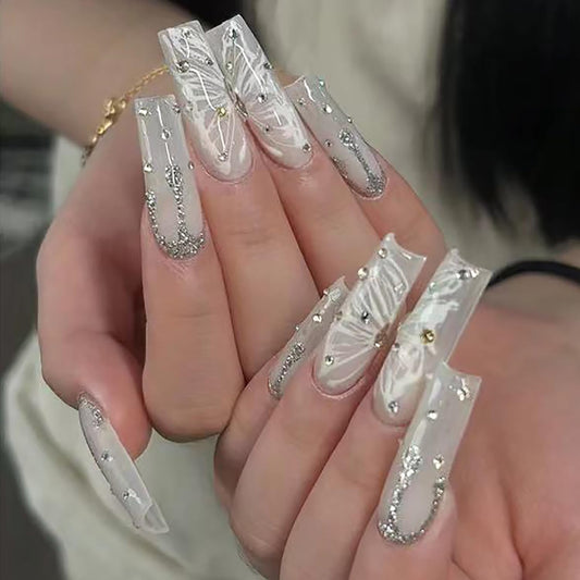 24 Pcs Long Coffin Press on Nails Cute Acrylic Fake Nails Nude Glitter False Nails with Butterfly Pattern Designs Rhinestone Nail Press ons Glossy Glue on Nails Full Cover Stick on Nails for Women