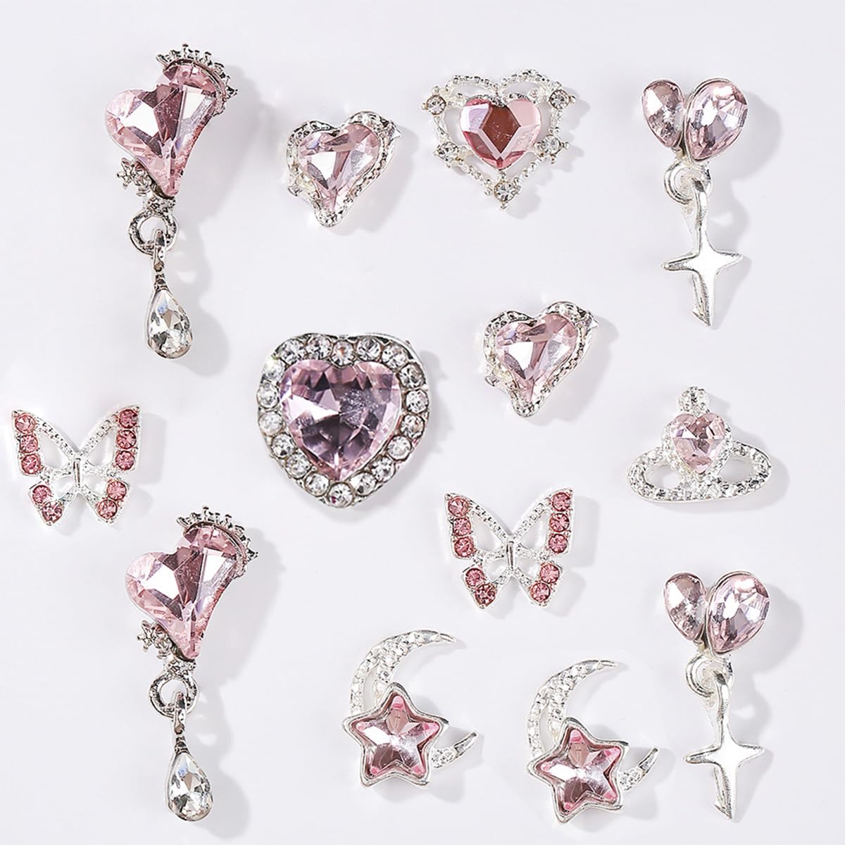 16Pcs Pink Butterfly Moon Heart Nail Charms for Nail Art Luxury 3D Silver Crystals Nail Gems Metal Pink Planet Heart Moon Nail Art Rhinestones for Acrylic Nails Jewelry DIY Manicure Accessories