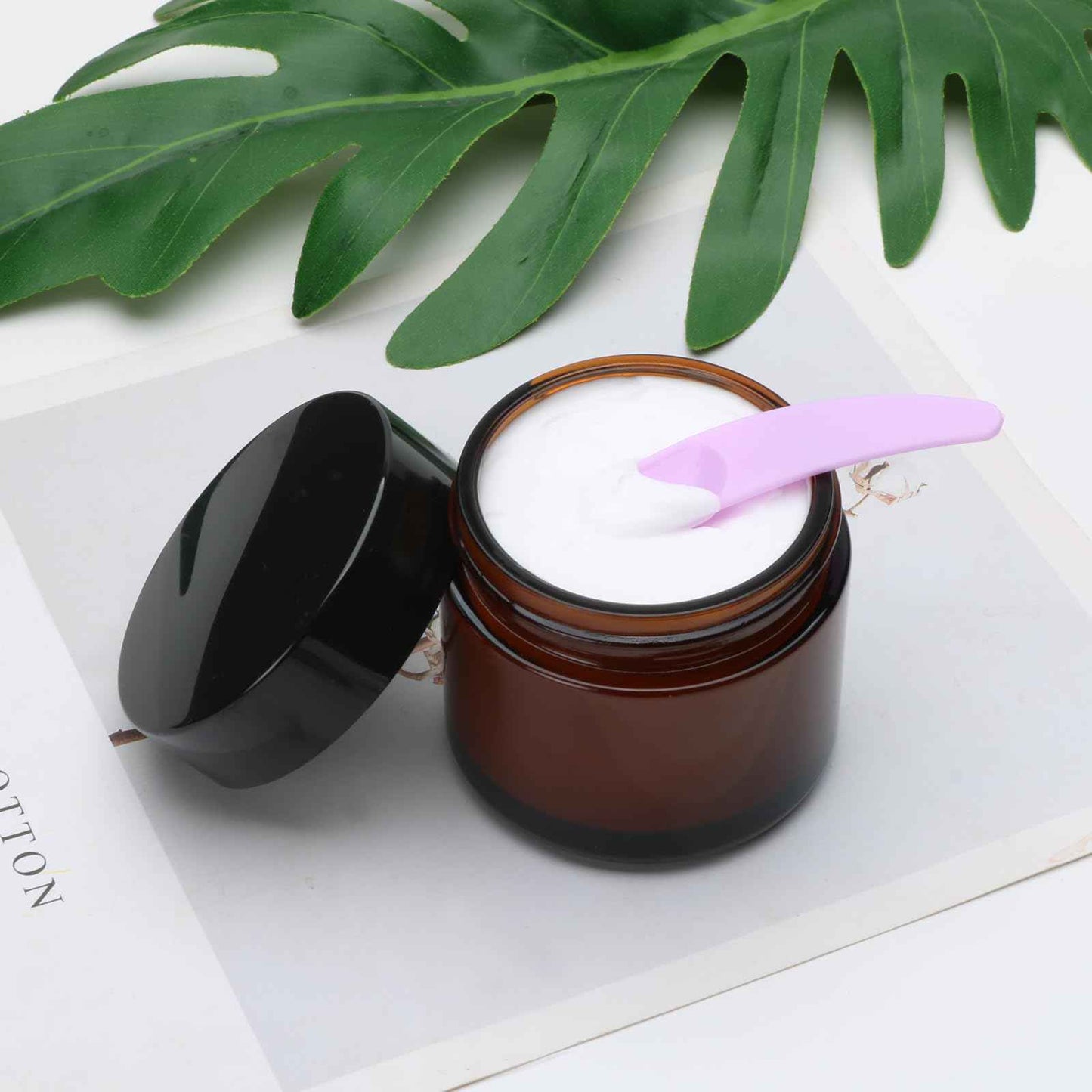 2oz Small Travel Containers with Black Lids,48 Pack Amber Glass Jars with Mini Disposable Spatula for Toiletries，Travel Storage，Makeup Beauty Products, Lotions, Powders and Ointments