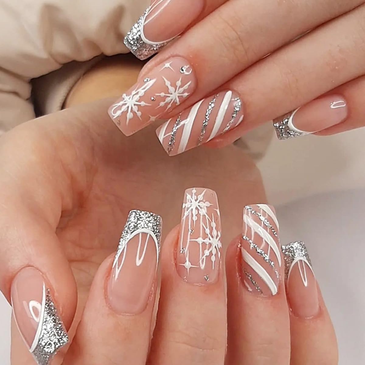 Christmas Press on Nails Medium Nude Fake Nails with Glitter French Edge Snowflake Designs Sliver White Stripes False Nails Glossy Glue on Nails Artificial Nails Winter Xmas for Women Girls 24Pcs