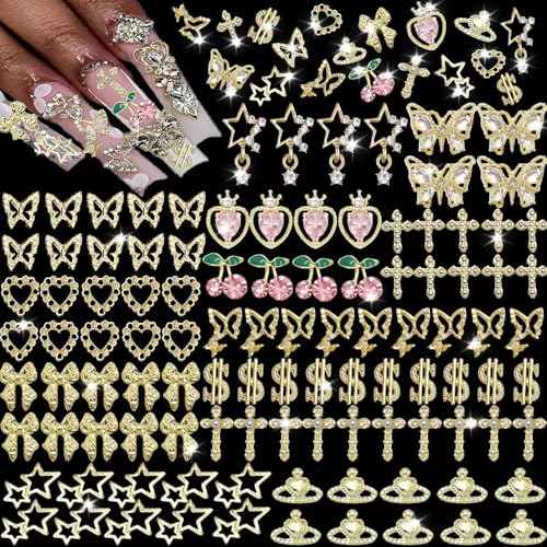 106 PCS Gold Nail Charms 3D Nail Art Charms Cherry Butterfly Cross Bow Star Heart Dollar 3D Nail Gems for Women Nail Art DIY Design