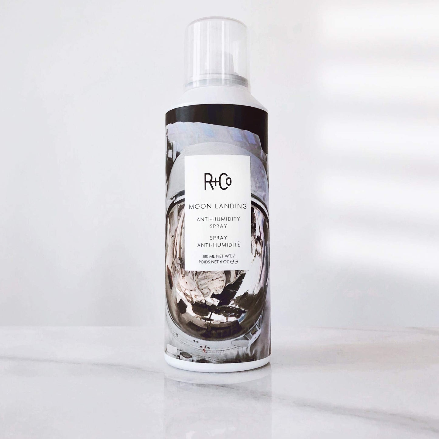 R+Co Moon Landing Anti-Humidity Spray | Calms Frizz + Repels Moisture + Tames Flyaways | Vegan + Cruelty-Free | 6 Oz