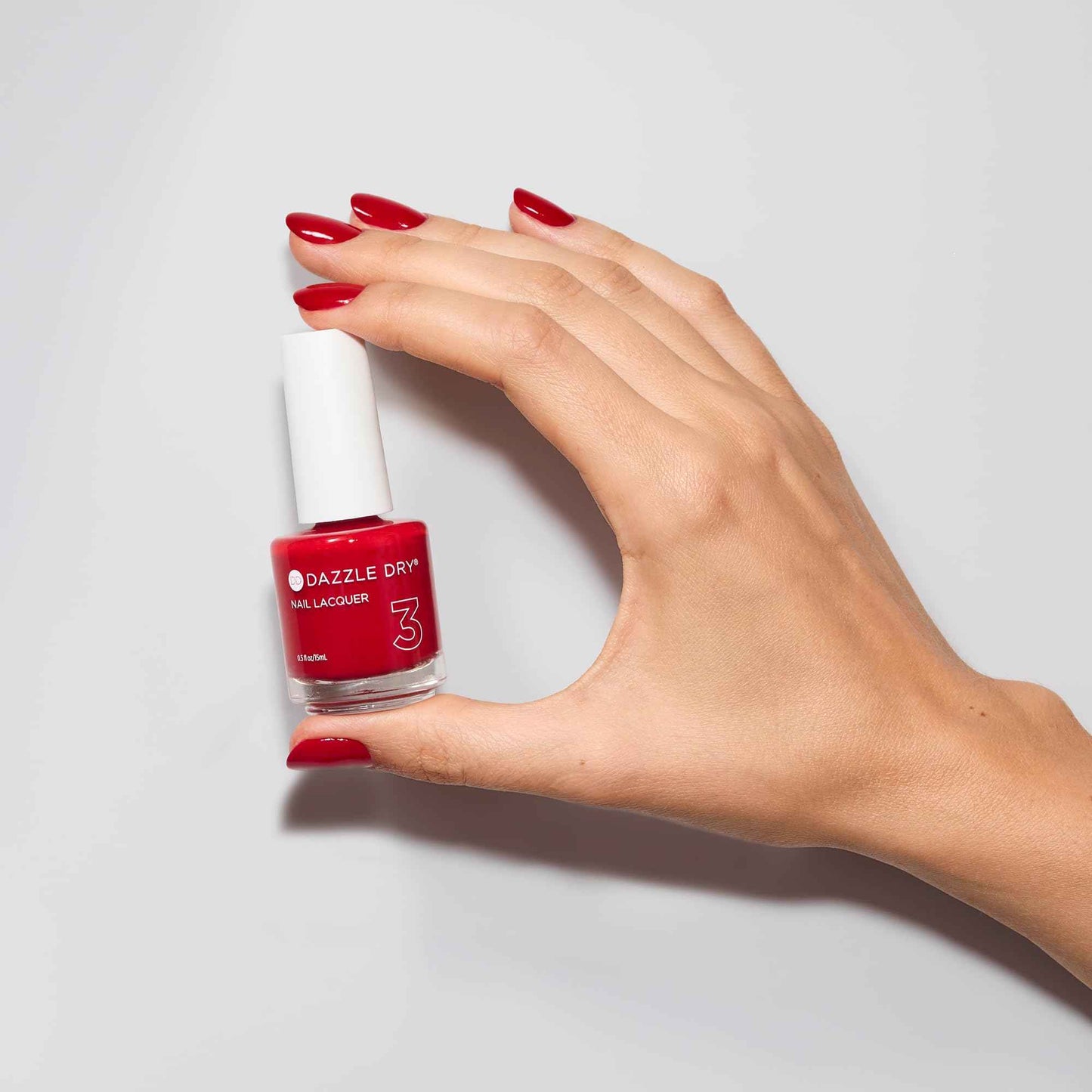 Dazzle Dry Nail Lacquer (Step 3) - Rapid Red - A full coverage classic true red. (0.5 fl oz)