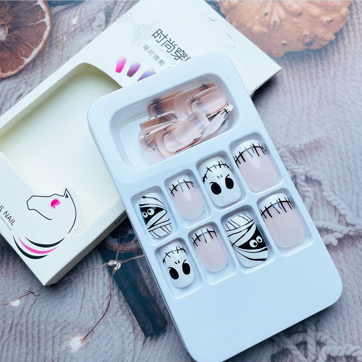 NEWSPIED Halloween Press on Nails Short Square Fake Nails White French Tip Acrylic Nails with Mummy Skull Design Cute Glue on Nails Halloween Nails Press on Full Cover False Nails for Women 24Pcs