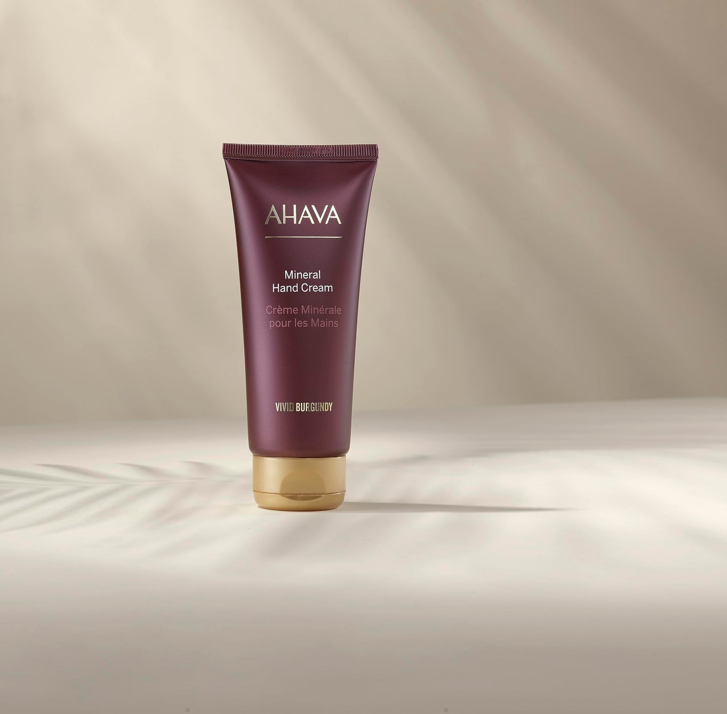 AHAVA Mineral Hand Cream Vivid Burgundy - Luxurious cream for thirsty hands for deep relief & nourishment, maintains smooth & supple hands, with exclusive Dead Sea Mineral blend Osmoter, 3.4 Fl.Oz