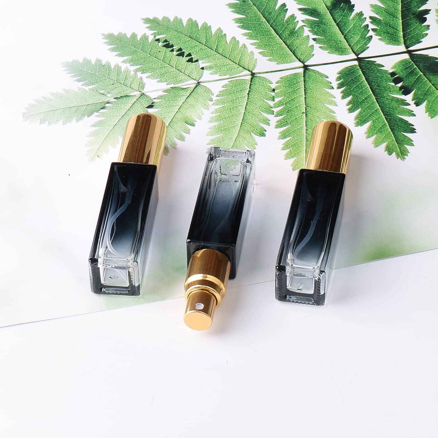 Newzoll 45pcs 10ml Mini Square Spray Bottle Glass Empty Spray Refillable Perfume Bottle Fine Mist Liquid Dispenser for Makeup Skin Care (Gold Cap)