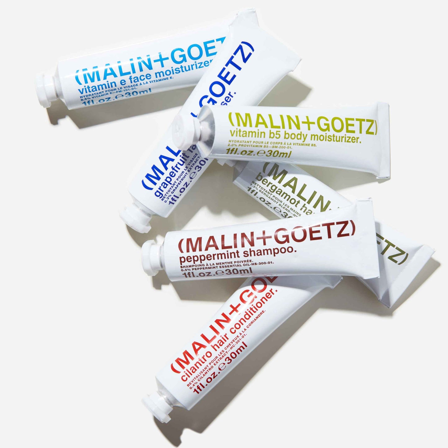 "Malin + Goetz Essential Starter Kit, 1 Fl. Oz. - Hair Shampoo & Conditioner, Facial Cleanser & Moisturizer, Hand & Body Wash, Body Moisturizer, Travel Kit, Vegan & Cruelty Free"