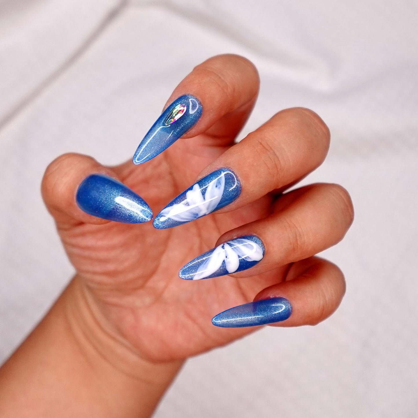 10 Pcs Handmade Press on Nails (X-Small, White Petal - Jelly Shimmer Blue with Hand Paint Artsy White Petal Butterfly and Holo Rhinestone Nail Tips/Stiletto) A113XS