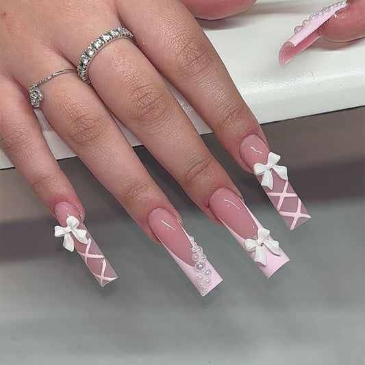 24 Pcs French Tip Press on Nails Long Coffin Fake Nails Spring Pink False Nails with Pearl Bows Designs Glossy Nail Tips Nude Full Cover False Nails Cute Acrylic Glue on Nails Stick on Nails for Women