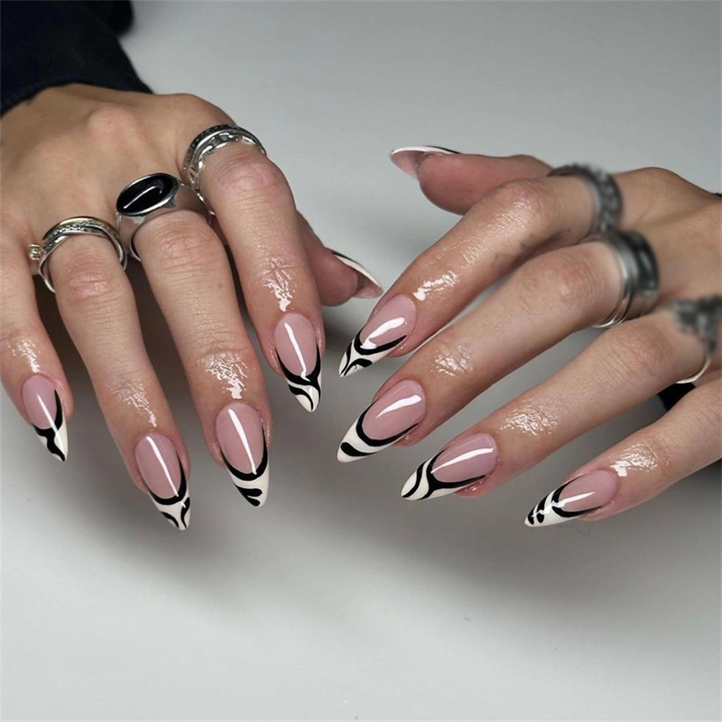 MISUD Press on Nails Medium Almond Fake Nails Glossy Glue on Nails Black White Swirl Acrylic Nails Stiletto Artificial Nails French Tip Stick on False Nails with Design 24 pcs