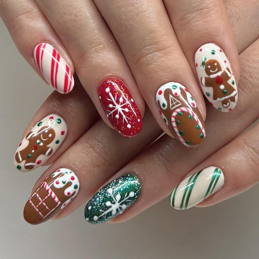 Christmas Cute Nails Press on Nails Short Oval Fake Nails with Designs Snowflake Gingerbread Man Candy Canes House Full Cover Acrylic Almond False Nails Winter Glue on Nails for Women and Girls 24Pcs