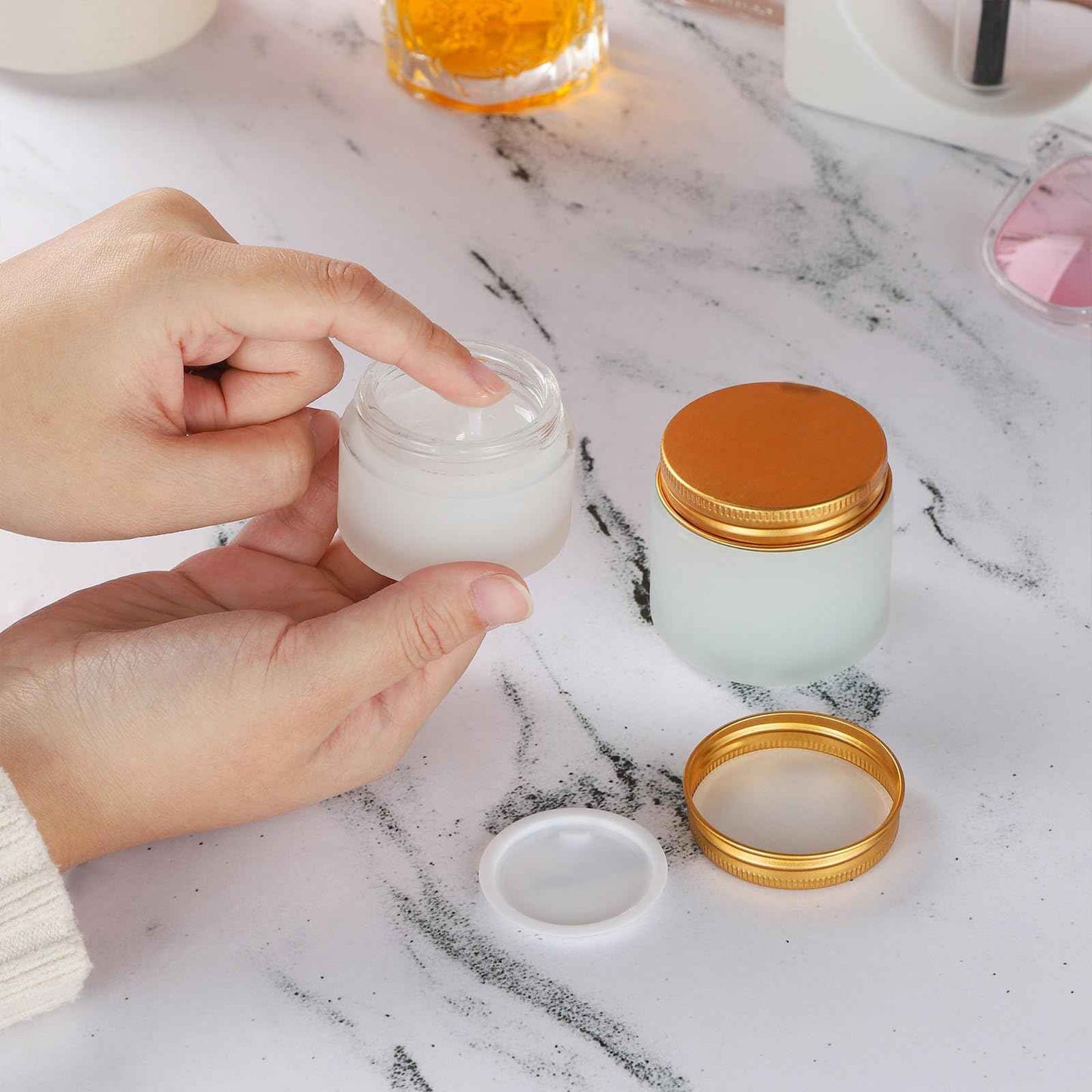 RAMFIYN 24 pack Small Clear Frosted Glass Cosmetic jars with Golden Metal Lids 2oz Bulk for Sample Lotion Cream Travel Jar Cosmetic Container