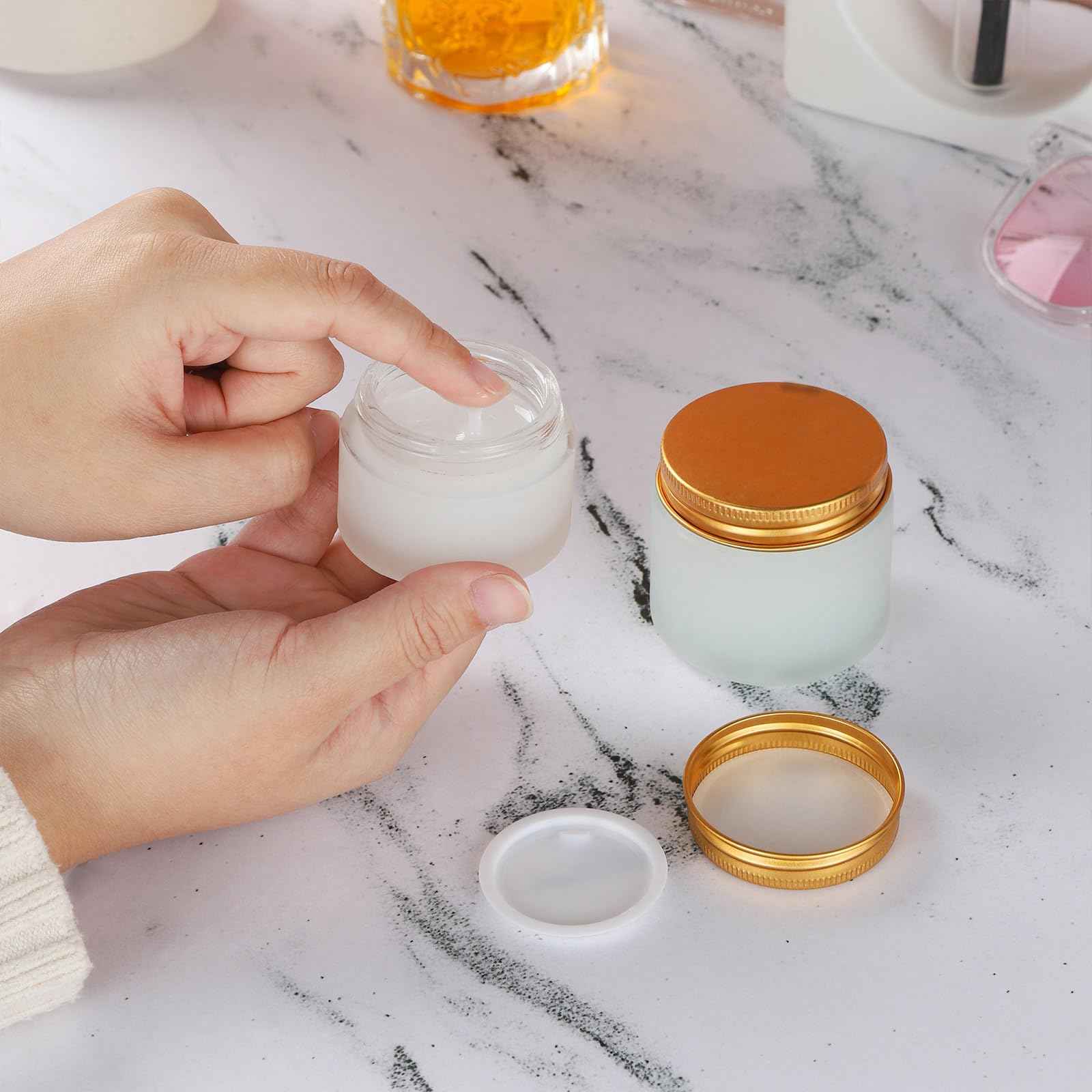 RAMFIYN 24 pack Small Clear Frosted Glass Cosmetic jars with Golden Metal Lids 2oz Bulk for Sample Lotion Cream Travel Jar Cosmetic Container