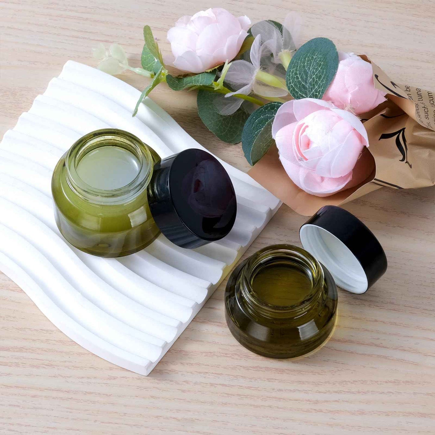 TkoYuHm 12 pack Glass Cosmetic Jars with Lids Small Lotion Containers for Traveling Green Empty Skincare Container for Face Cream Toiletries Makeup (1oz)