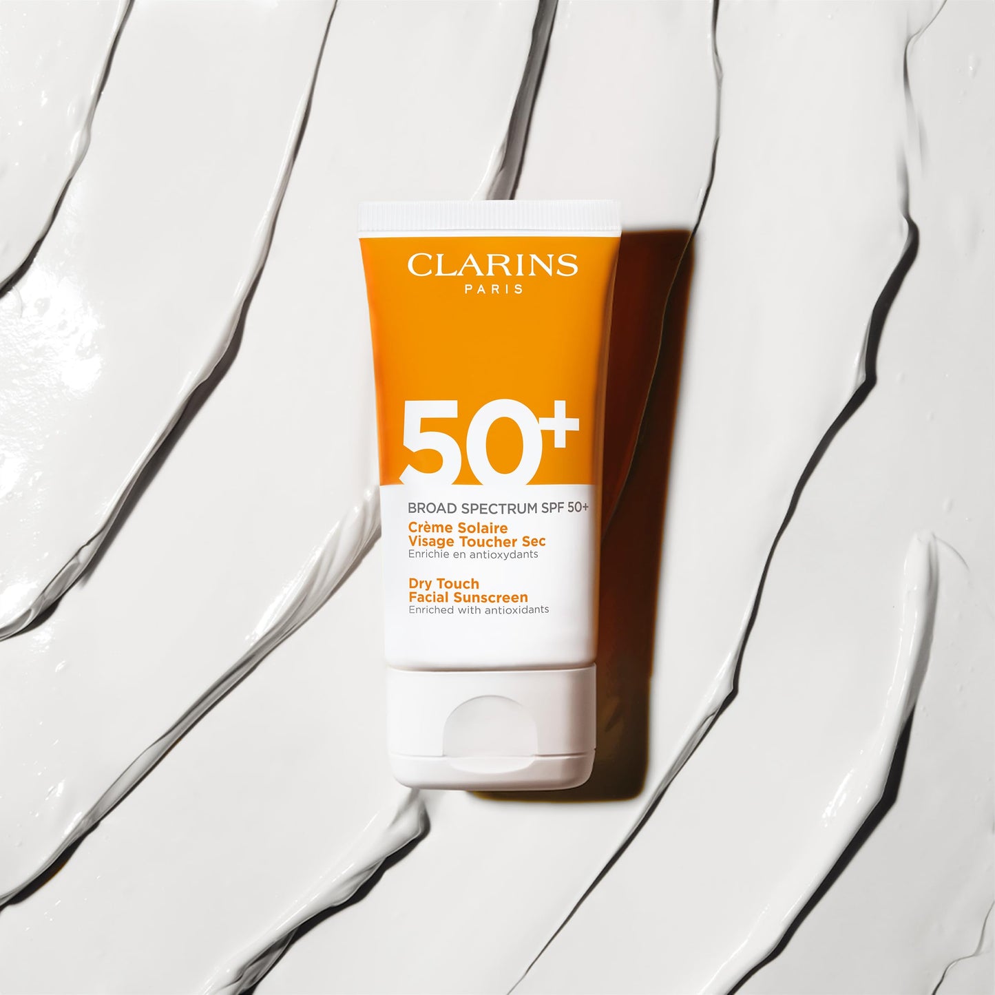 Clarins Dry Touch Face Sunscreen | Broad Spectrum SPF 50+ | UVA/UVB Protection | Lightweight and No White Cast | Enriched with Antioxidants | All Skin Types, including Sensitive Skin | 1.7 Ounces