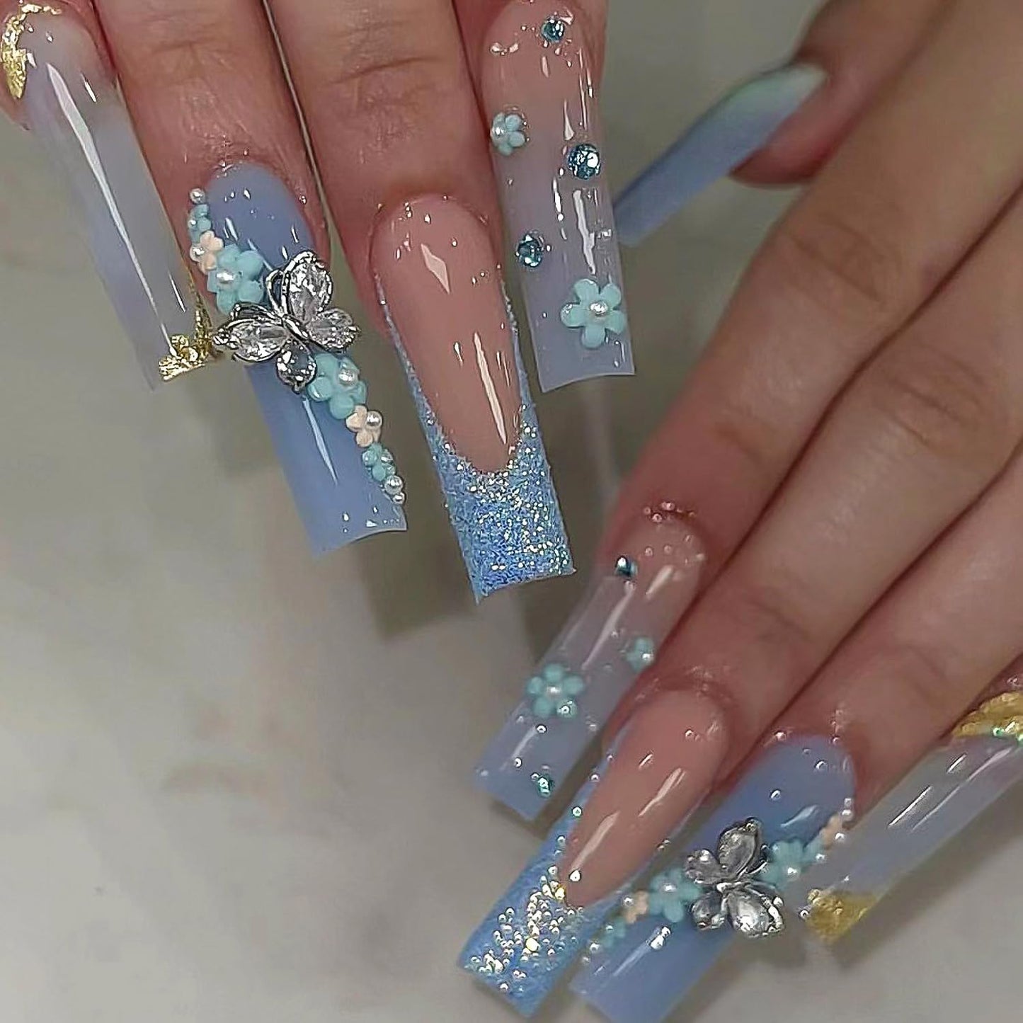 French Tip Press on Nails Long Square Sokfone Blue Fake Nails with Flower Butterfly Charm Designs Stick on Nails Full Cover Artificial Nails for Women