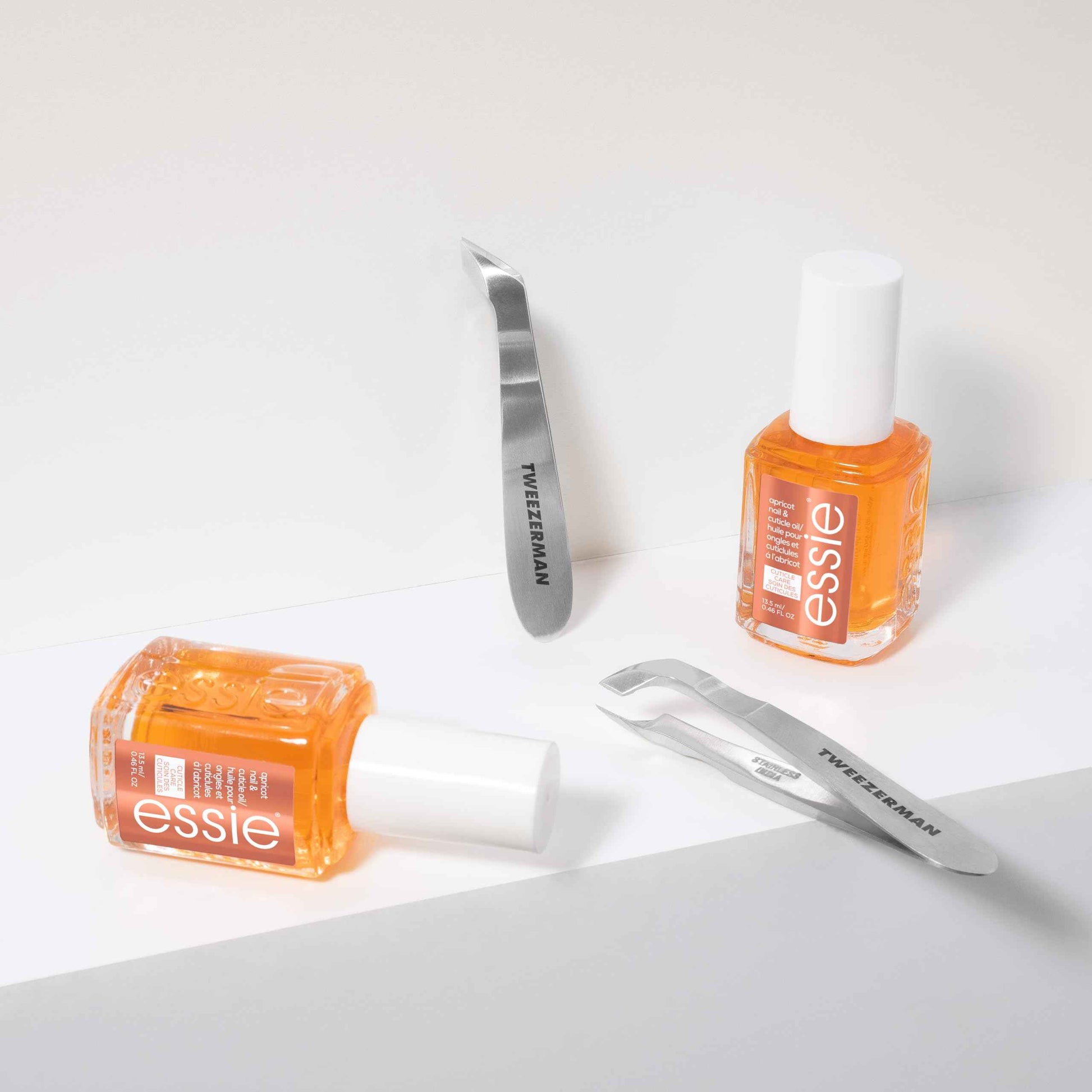 Tweezerman x Essie: The Cuticle Expert Bundle - Essie's Apricot Cuticle Oil And Tweezerman's Mini Cuticle Nipper