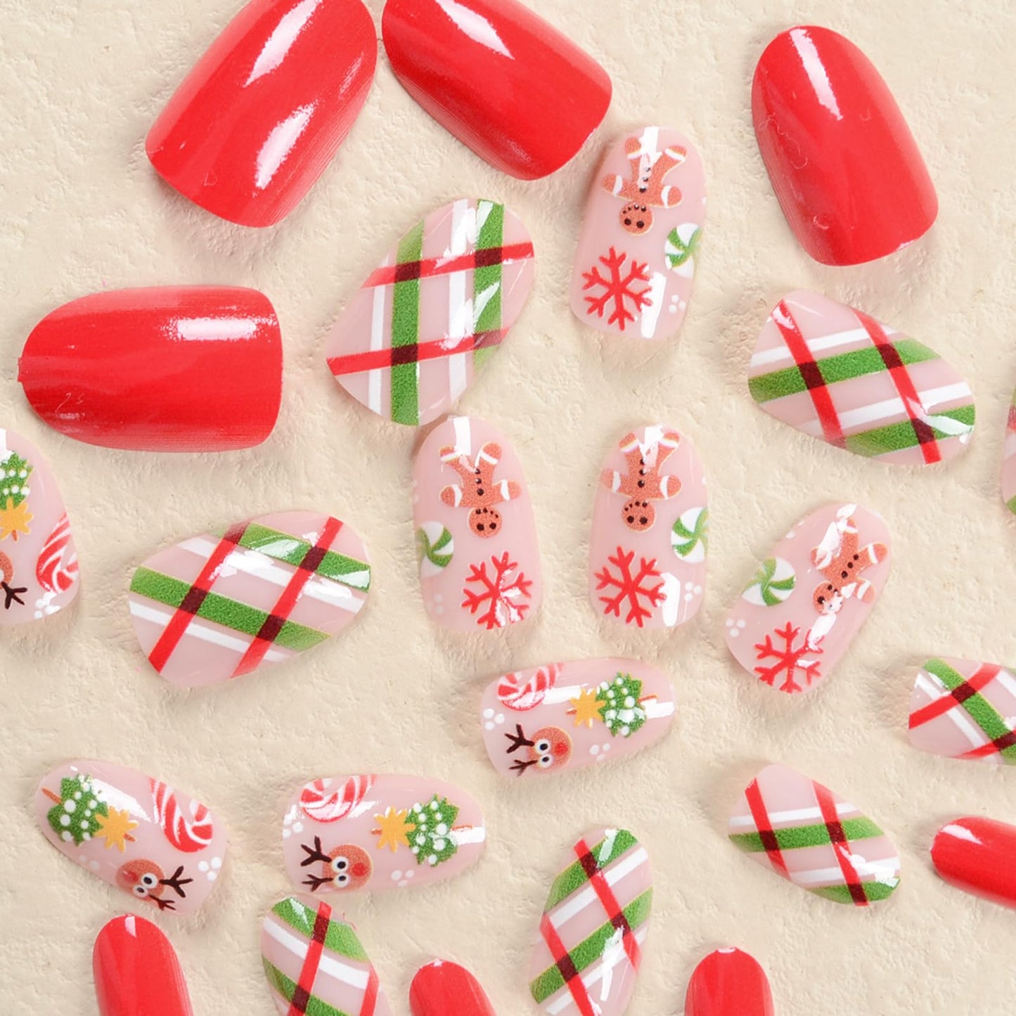 Christmas Red Nails Press on Nails Short Oval Fake Nails with Designs Gingerbread Man Candy Canes Snowflake Reindeer Stripe Full Cover Acrylic Square Nude Winter False Nails for Women and Girls 24Pcs