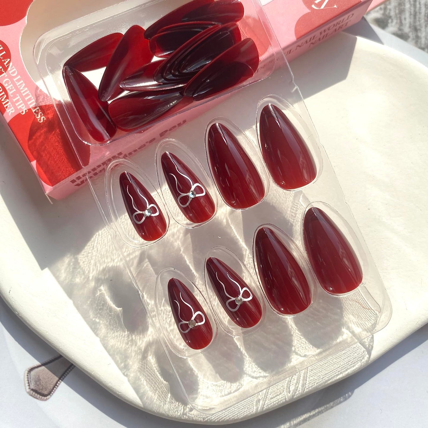 Burgundy Press on Nails Medium Almond - UCCASA Winter Almond Fake Nails Press ons Solid Color with Bow Design Full Cover False Nails Glue on Nails Stick on Nails Artificial Acrylic Nail Art Kit 24 Pcs