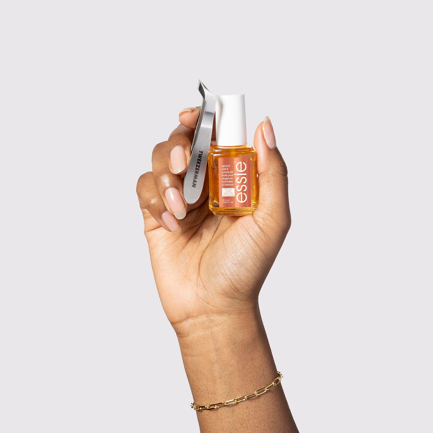 Tweezerman x Essie: The Cuticle Expert Bundle - Essie's Apricot Cuticle Oil And Tweezerman's Mini Cuticle Nipper