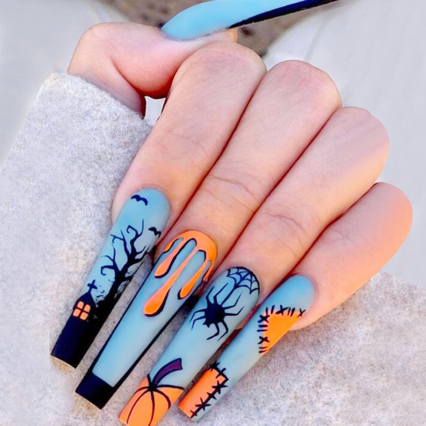 Halloween Press on Nails Long Coffin Fake Nails Matte Glue on Nails Blue Acrylic Nails with Spider Pumpkin Bat Designs Spider Web False Nails Halloween Stick on Nails for Women 24Pcs