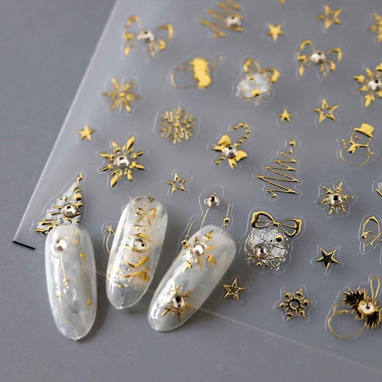 Christmas Nail Stickers Gold Nail Art Stickers Snowflake Snowman Nail Decals with Rhinestones Design Xmas Tree Bow Star Nails Art Decals 5D Embossed Winter Nails Decoration for Women