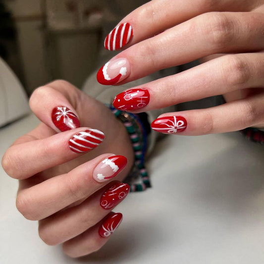 Christmas Red Nails Press on Nails Short Almond Fake Nails with Designs Snowflake Santa's Hat Ribbon Bow Full Cover Acrylic Oval False Nails Winter Glue on Nails for Women and Girls 24Pcs