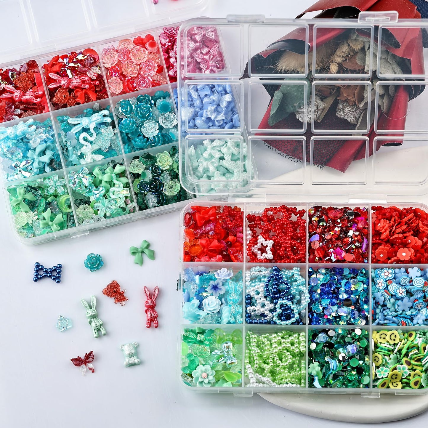 Kikonoke 2050 Pieces 3D Butterfly Rose Flower Bow Rabbit Bear Nail Charms Kit with Nail Art Rhinestones Pearls Crystal Gems Nail Slices for Manicure DIY Crafts Jewelry Accessories (Blue Green Red)